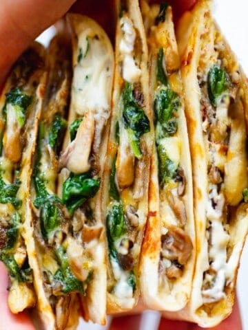 Easy Cheesy Vegan Quesadillas filled with cashew cheese, mushrooms and spinach.