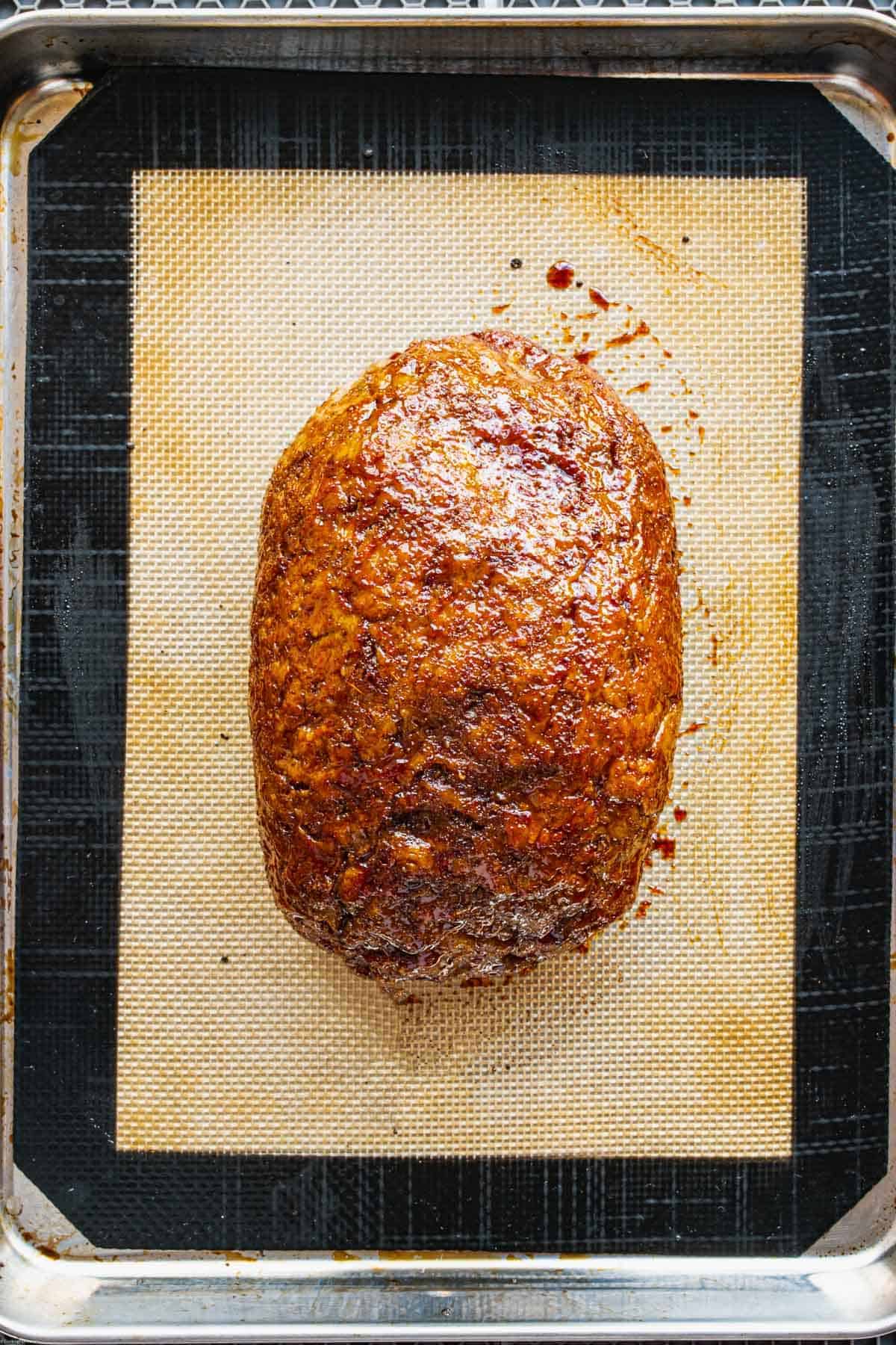 Roasted vegan turkey with glaze.