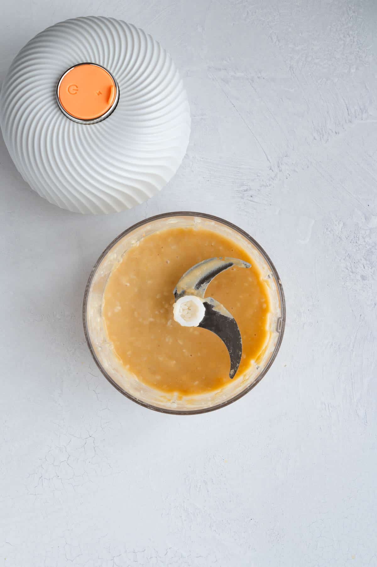 Mellow miso blended with water and sesame seeds in a small blender.