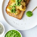 Green chutney on tofu scramble over whole wheat toast.