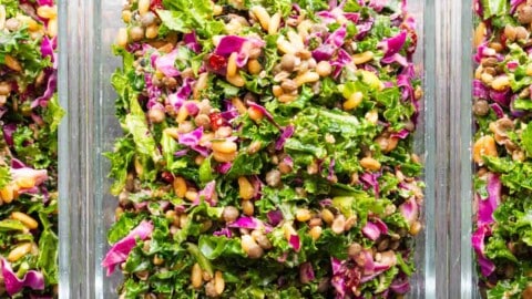 Healthy high-protein meal-prep salad in three glass containers.
