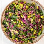 Miso bowl with kale, edamame, sesame seeds, spring onion, cabbage, and peanuts.