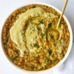 Instant pot quinoa lentil curry in a white bowl.