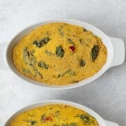Vegan crustless quiche in two white casserole dishes.