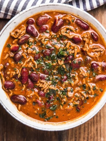 Vegan tofu chili in a white bowl.