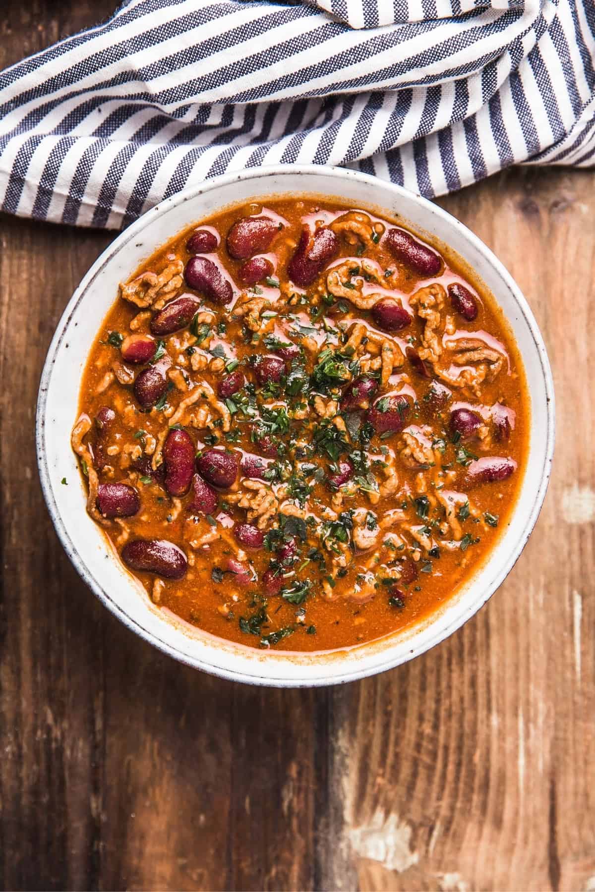 Vegan tofu chili in a white bowl.