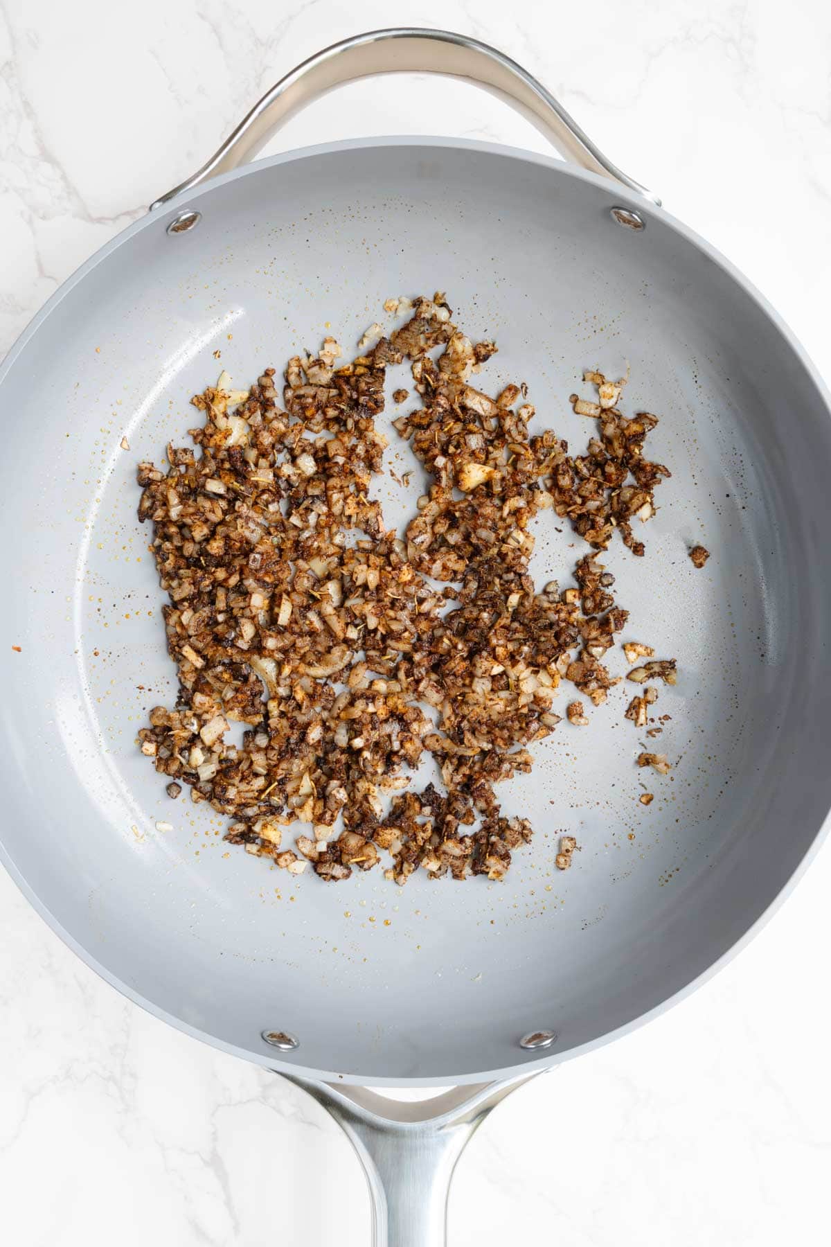 Cooked onion and garlic in spices.