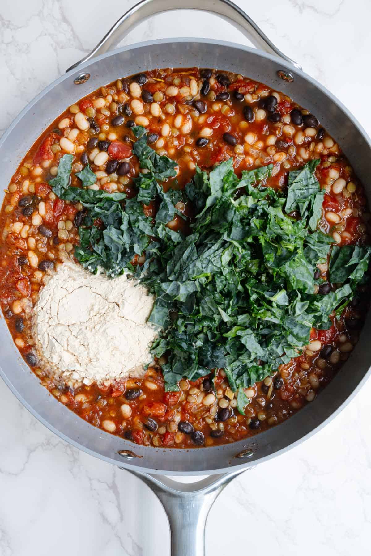 Tomatoes, beans, lentils, kale, veggie broth, and pea protein.