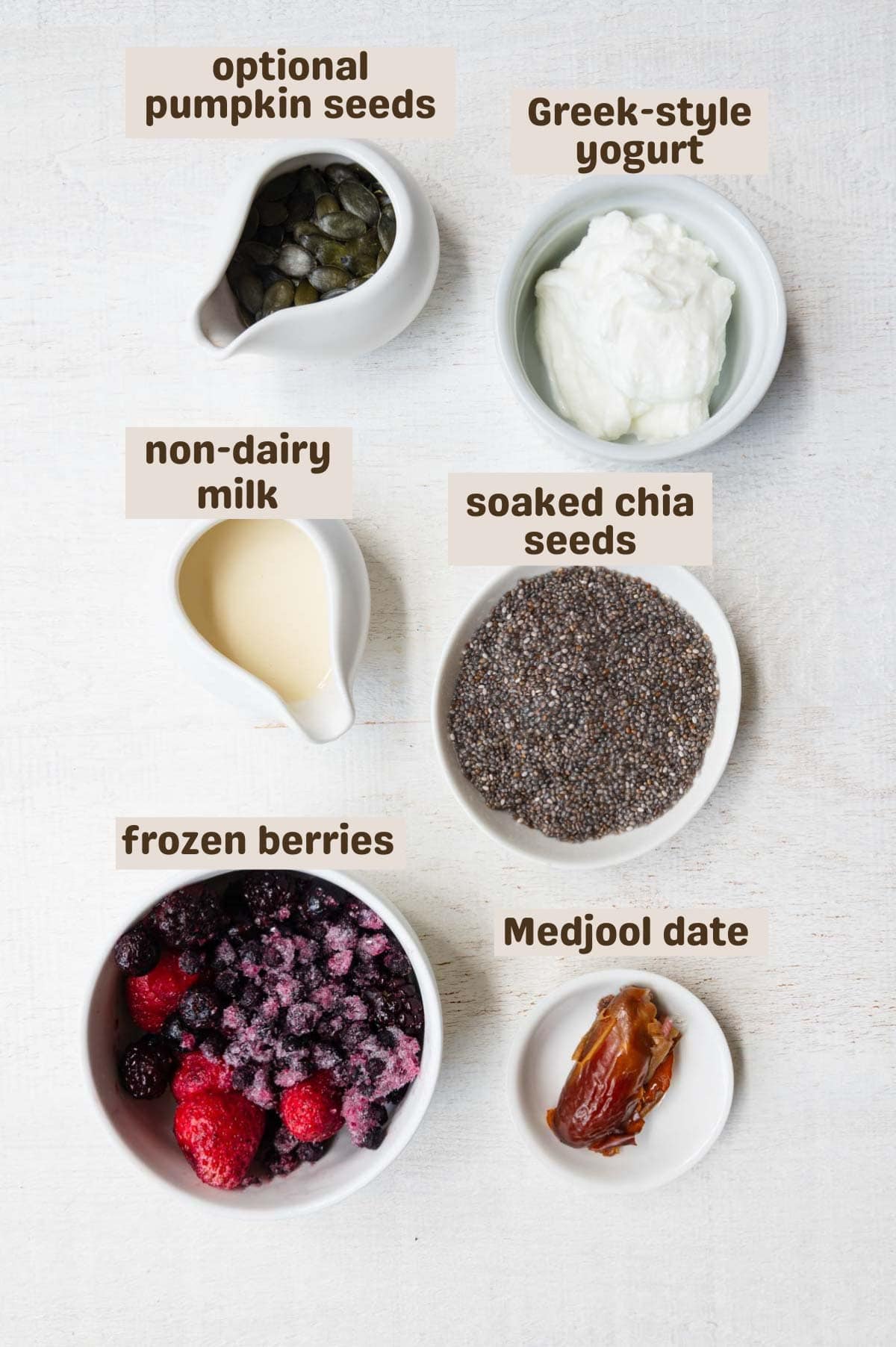 Pumpkin seeds, frozen berries, Medjool date, soaked chia seeds, non-dairy milk, and Greek-style yogurt.