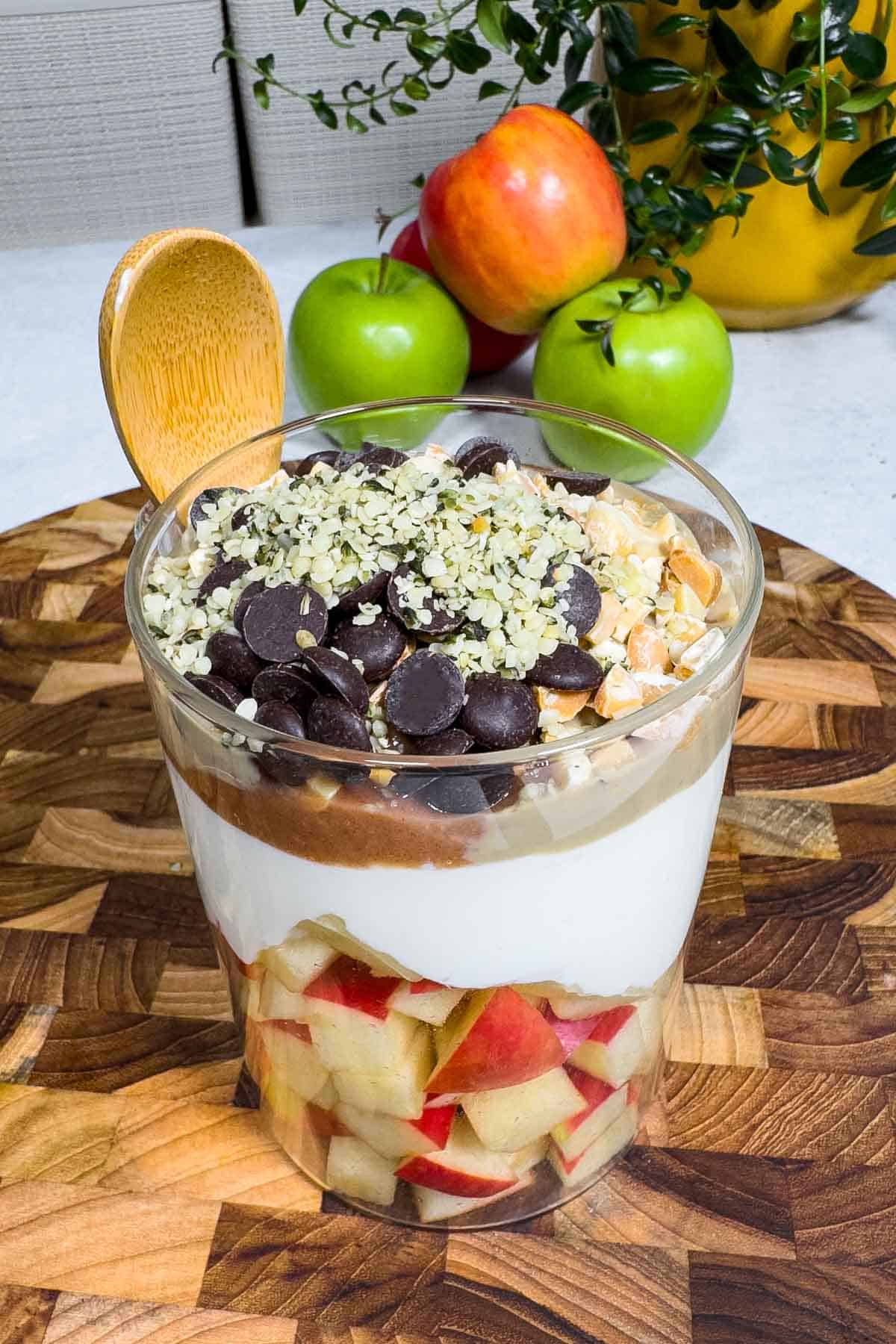 High-Protein Yogurt Parfait with Apple in a glass container.