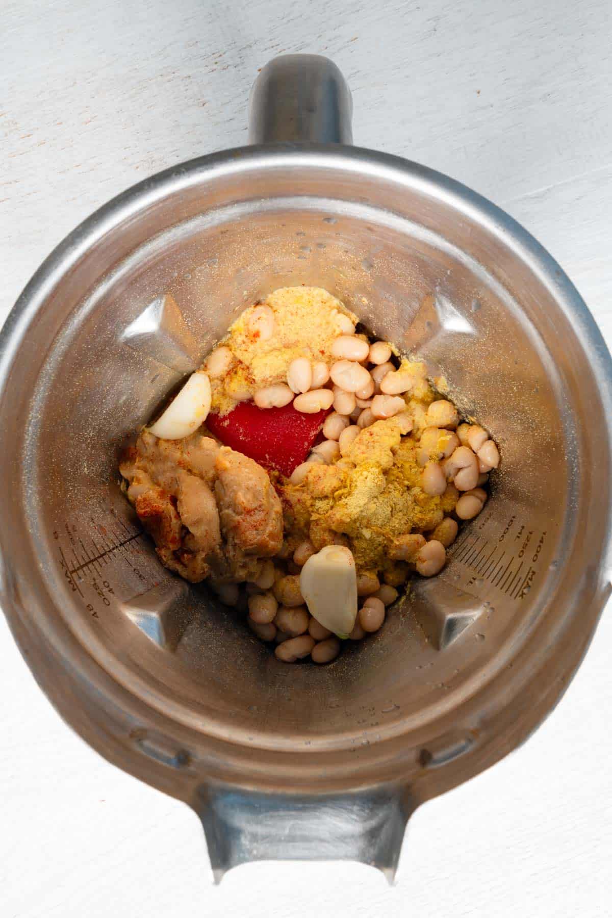 Ingredients for paprika sauce in a blender.