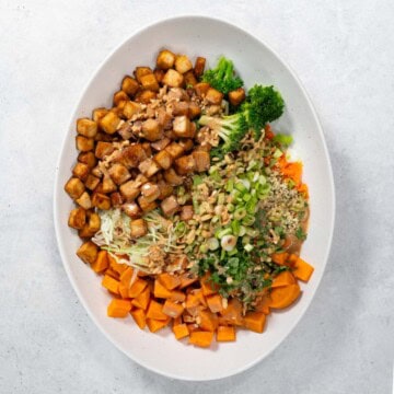 High-Protein Tofu Buddha Bowl in a white dish.