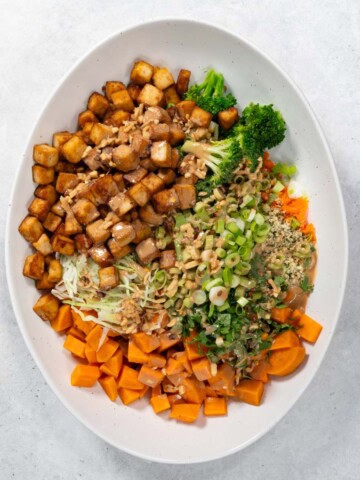 High-Protein Tofu Buddha Bowl in a white dish.