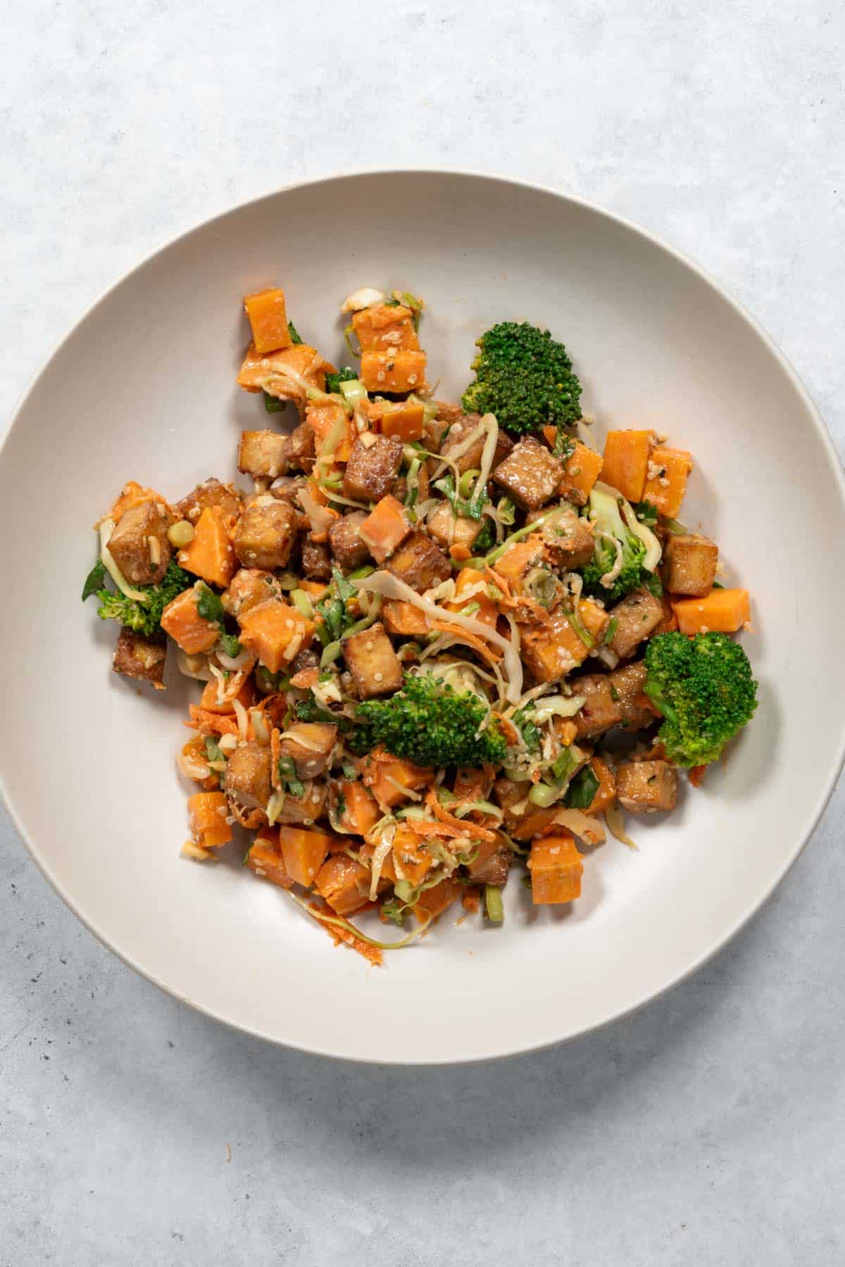 High-protein tofu buddha bowl plated.