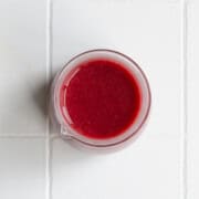Healthy Balsamic Cranberry Dressing in a glass jar.