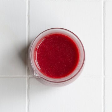 Healthy Balsamic Cranberry Dressing in a glass jar.