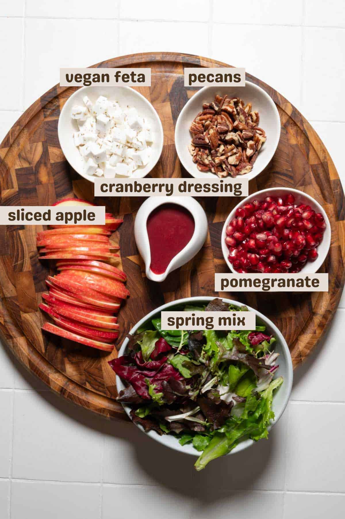 Vegan feta, spring greens mix, sliced apple, cranberry balsamic dressing, and chopped pecans.