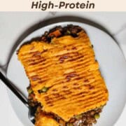 Vegetarian Lentil Shepherd's Pie on a plate with a fork.