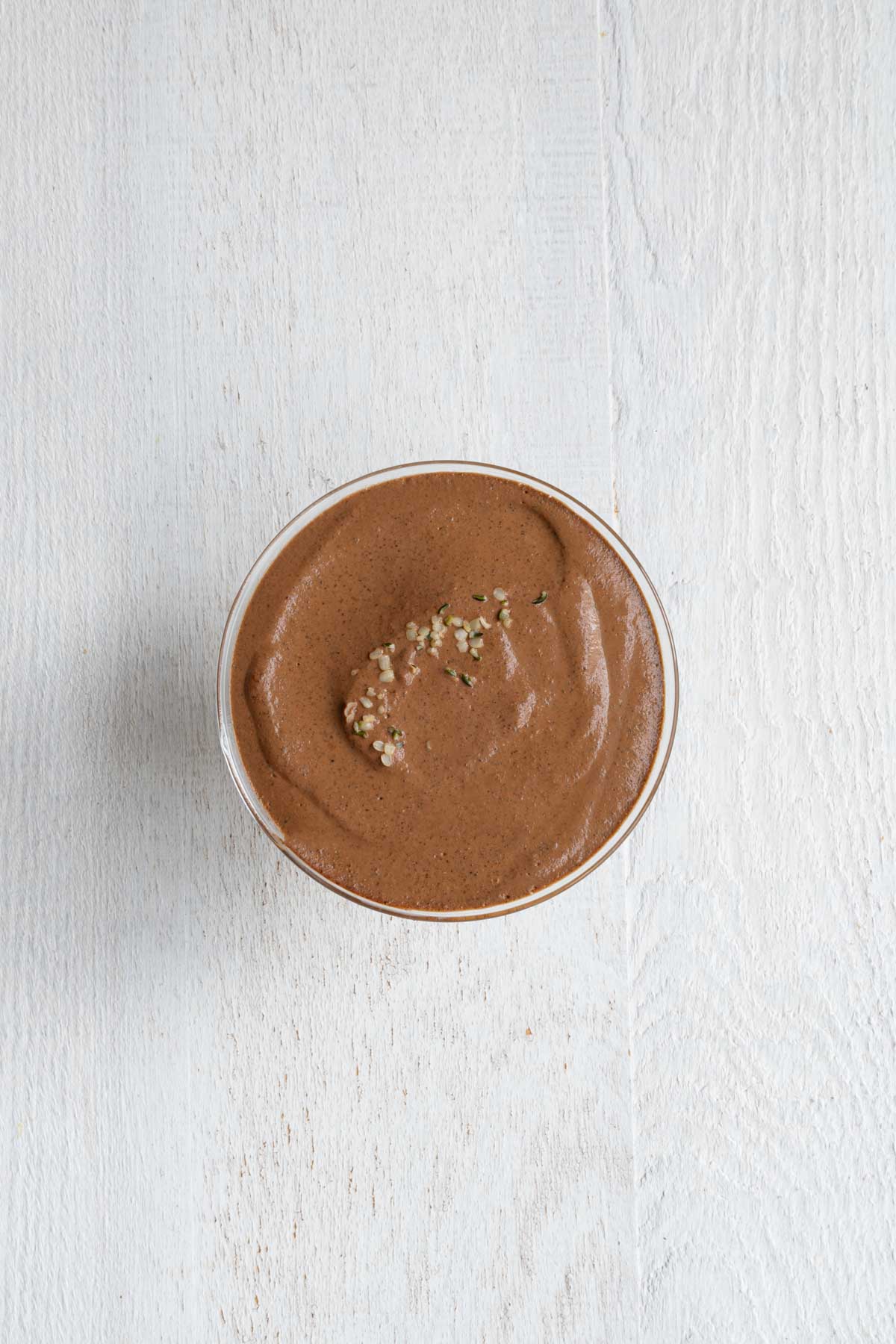 High-Protein Chocolate Chia Pudding in a glass bowl.