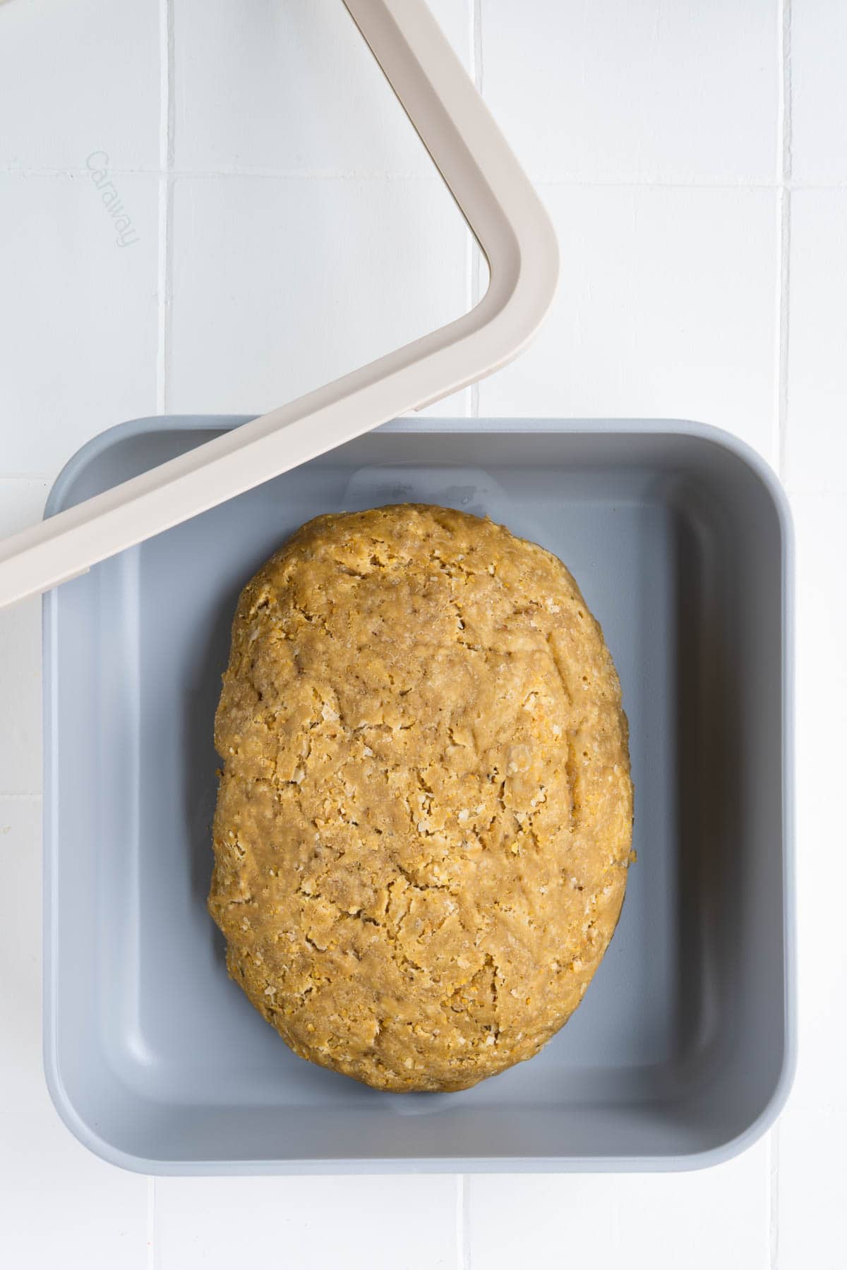 Premade dough stored in an airtight container.