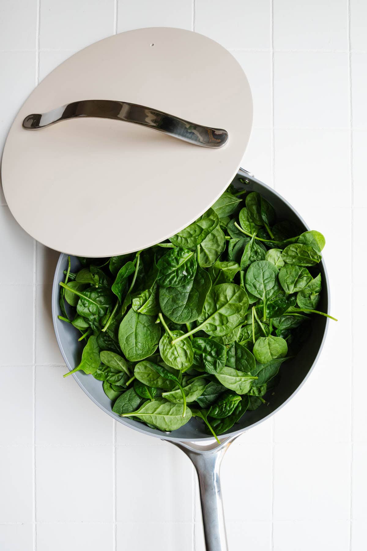 Leafy greens in a saucepan.