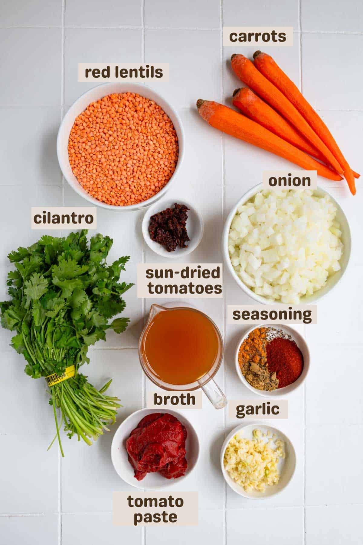 Red lentils, four carrots, sun-dried tomatoes, onion, garlic, tomato paste, and cilantro.