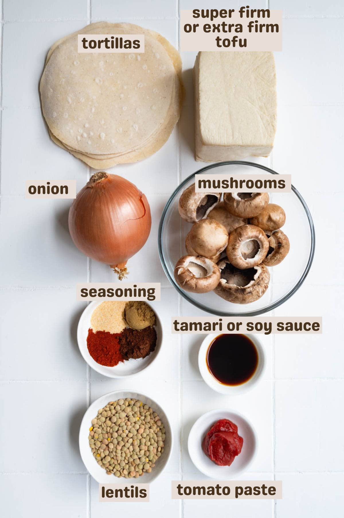 Tortillas, lentils, tomato paste, tamari, mushrooms, onion, seasoning, tortillas, and tofu.