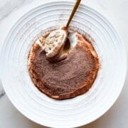 Tiramisu oats in a white bowl.