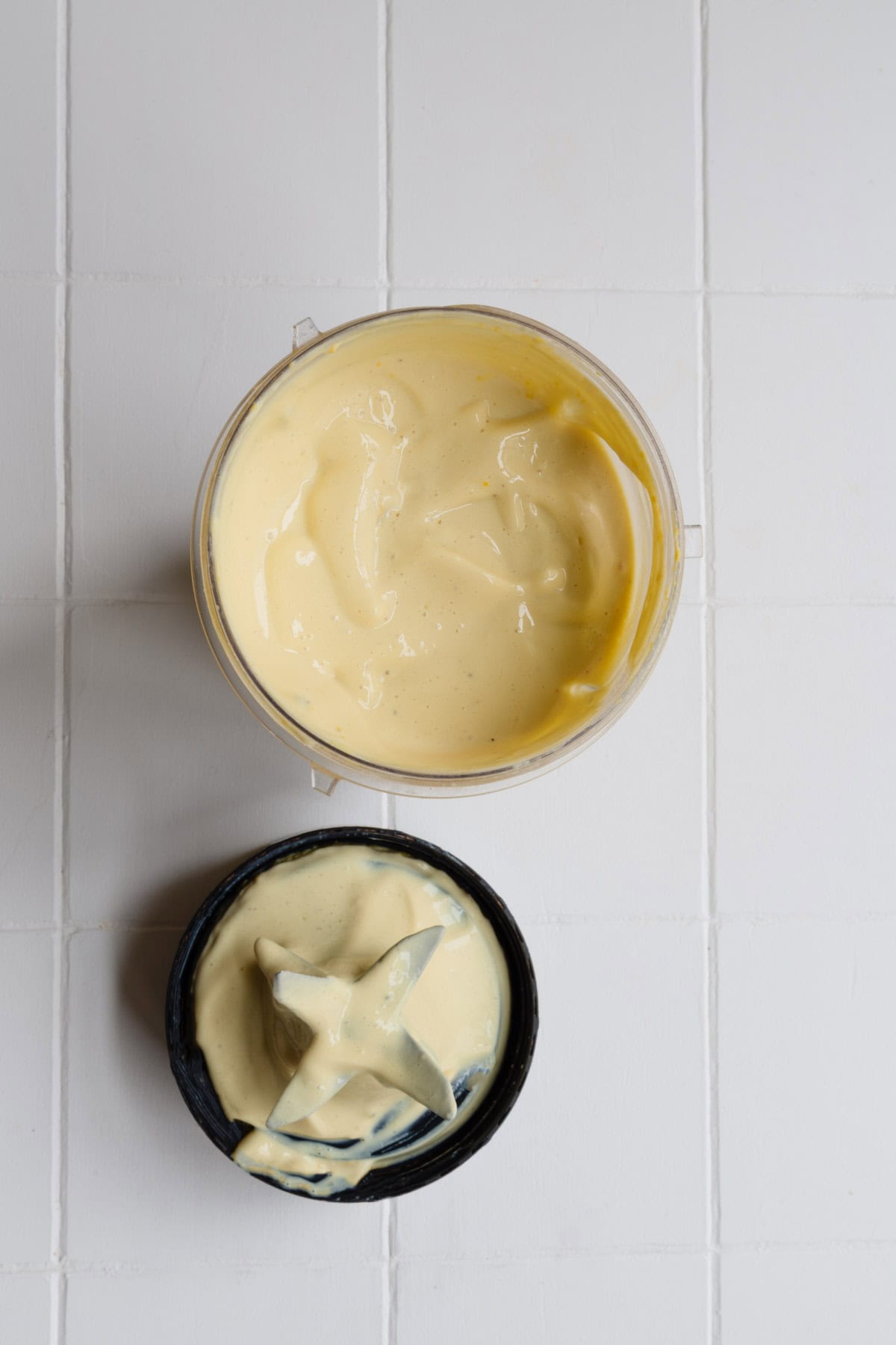 Blended nondairy cream in the canister of a blender.