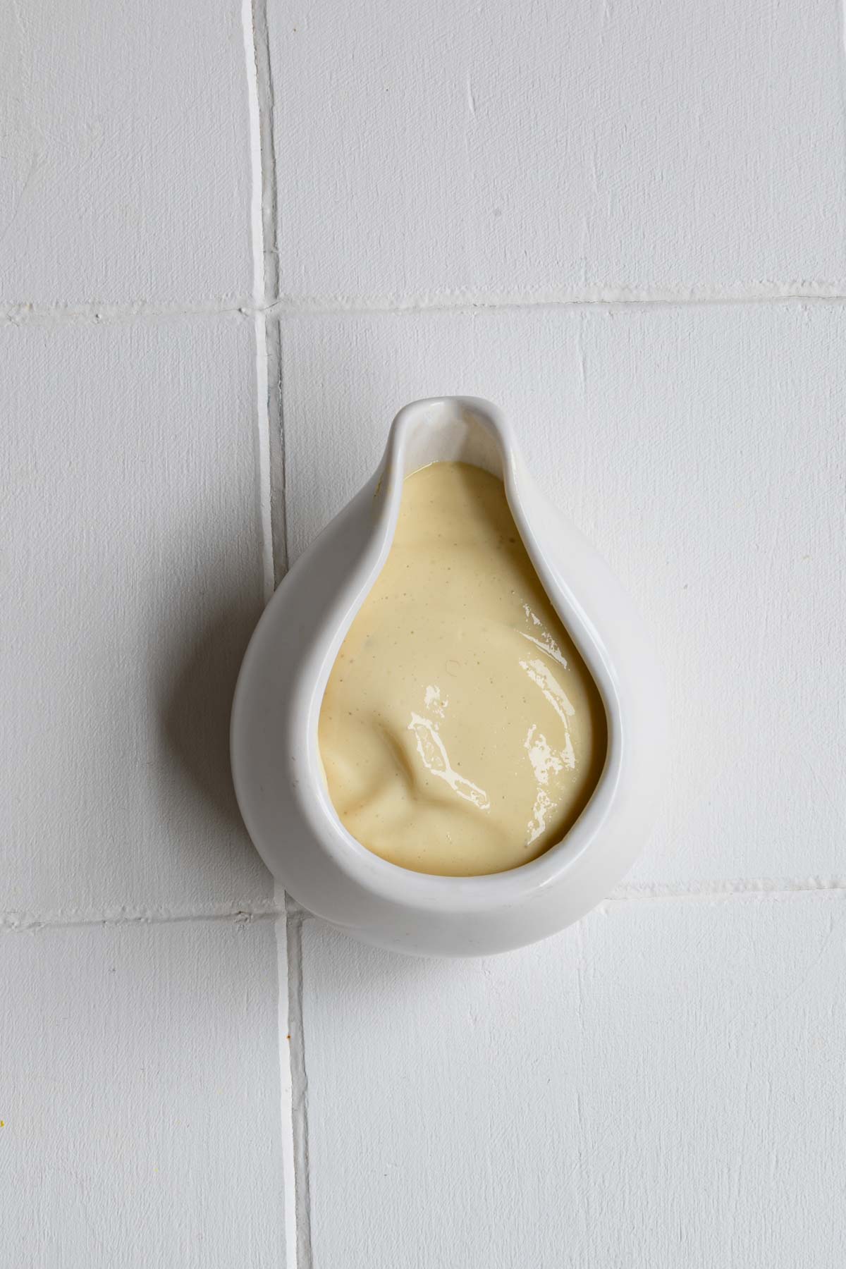 Tofu cream nondairy creamer in a white bowl.