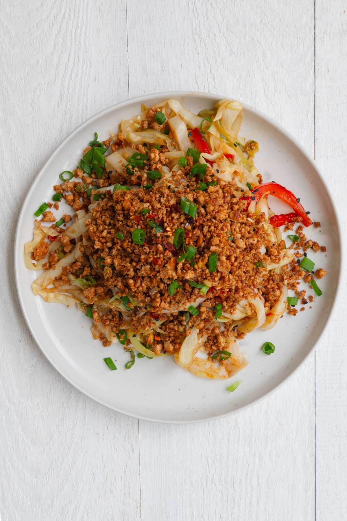 Cabbage stir-fry topped with tofu meat.