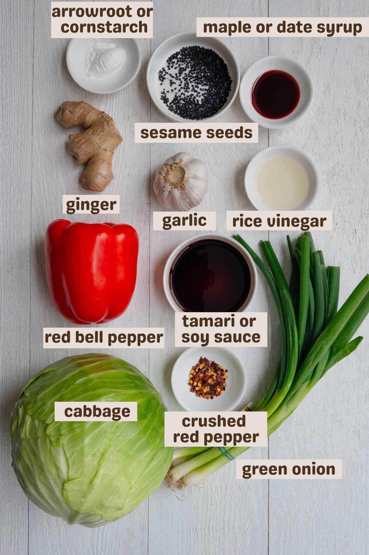 Cornstarch, green cabbage, sesame seeds, date syrup, rice vinegar, garlic, ginger, tamari, red bell pepper, crushed red pepper, cabbage, and green onion.