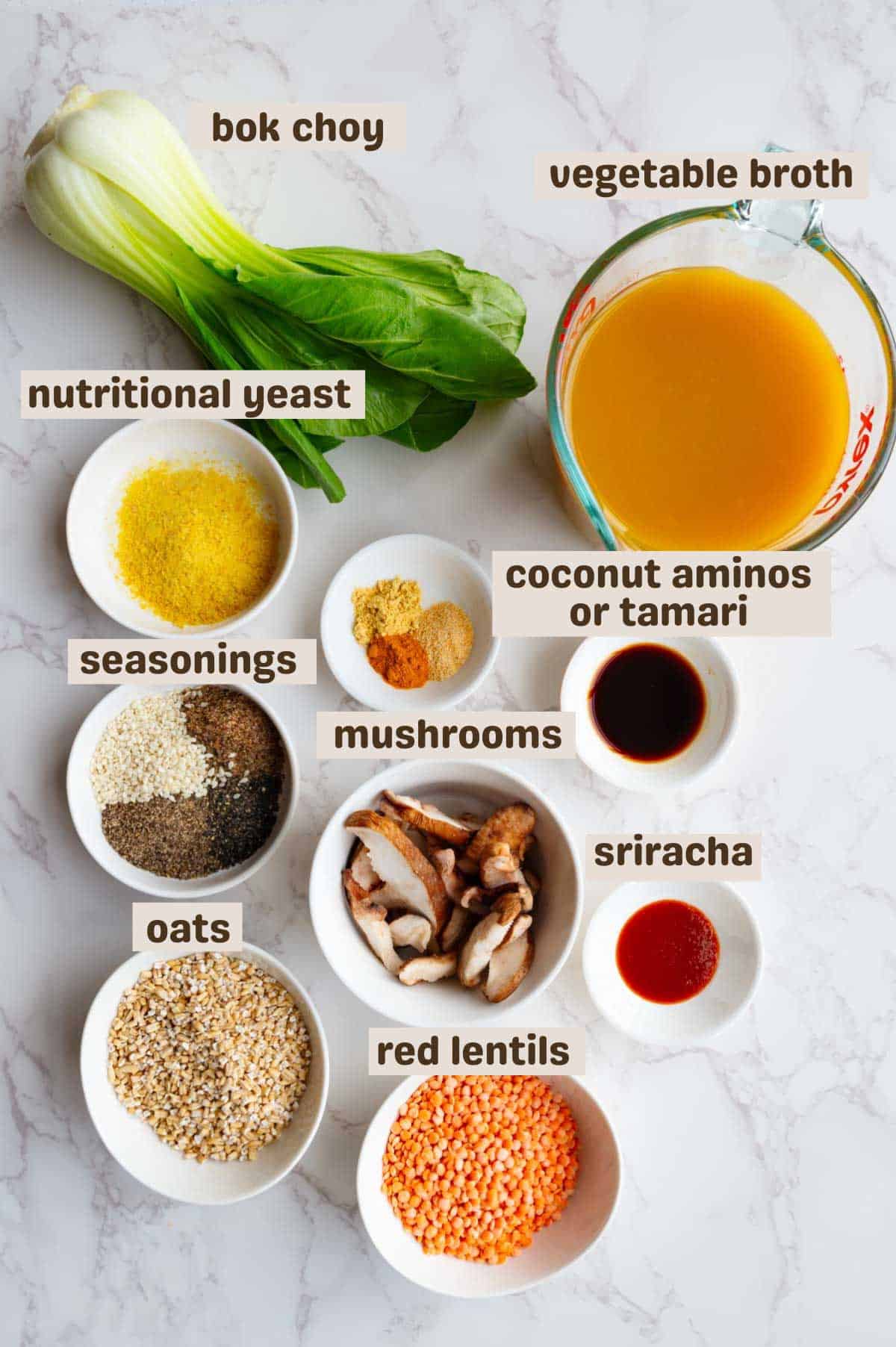 Bok choy, vegetable broth, nutritional yeast, seasonings, tamari, oats, red lentils, sriracha, and mushrooms.