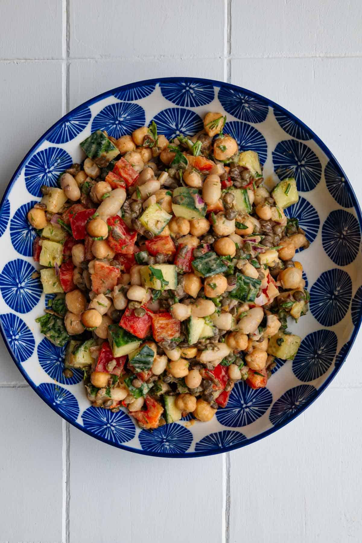 Smoky lemon herb bean salad in a bowl.
