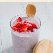 Strawberry chia pudding in a glass jar.