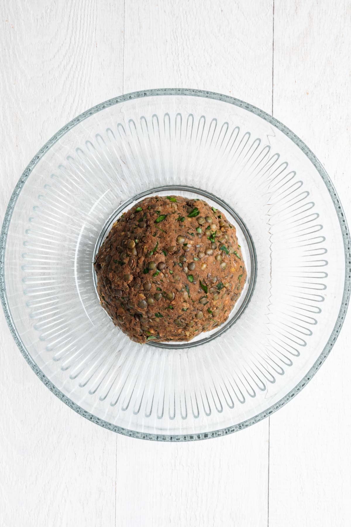 Spiced lentil arayes filling in a bowl.