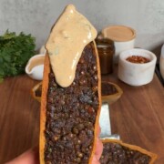 Crispy arayes stuffed with spiced lentil meat and served with a herby tahini yogurt sauce.