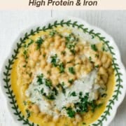 Creamy white beans topped with hemp cream and chopped parsley.