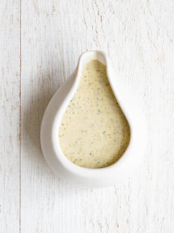 Hemp cream in a white pouring bowl.