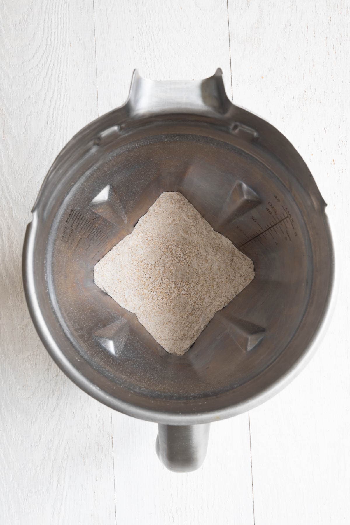 Ground protein rolled oats in a blender.