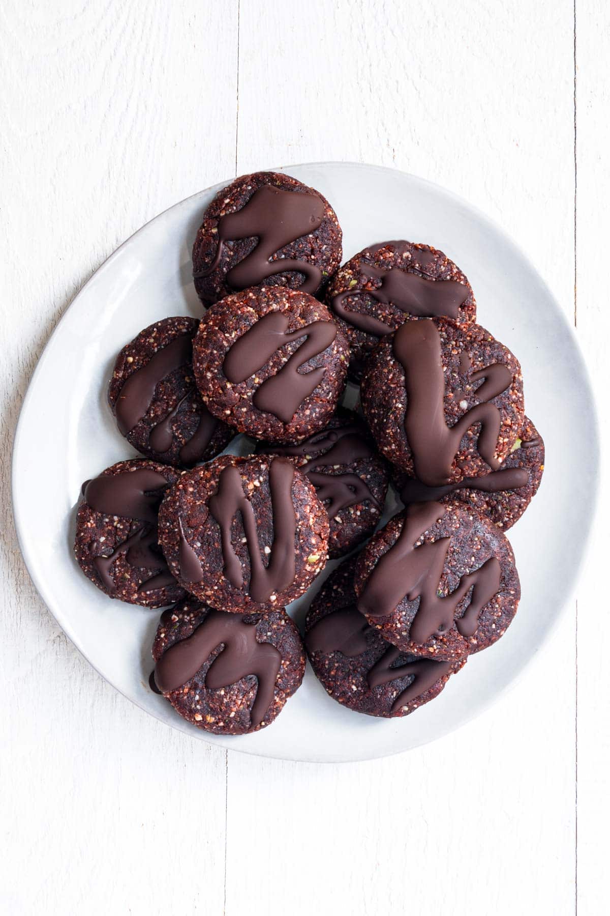 High-protein pre workout snack (no-bake cookies) on a white plate.