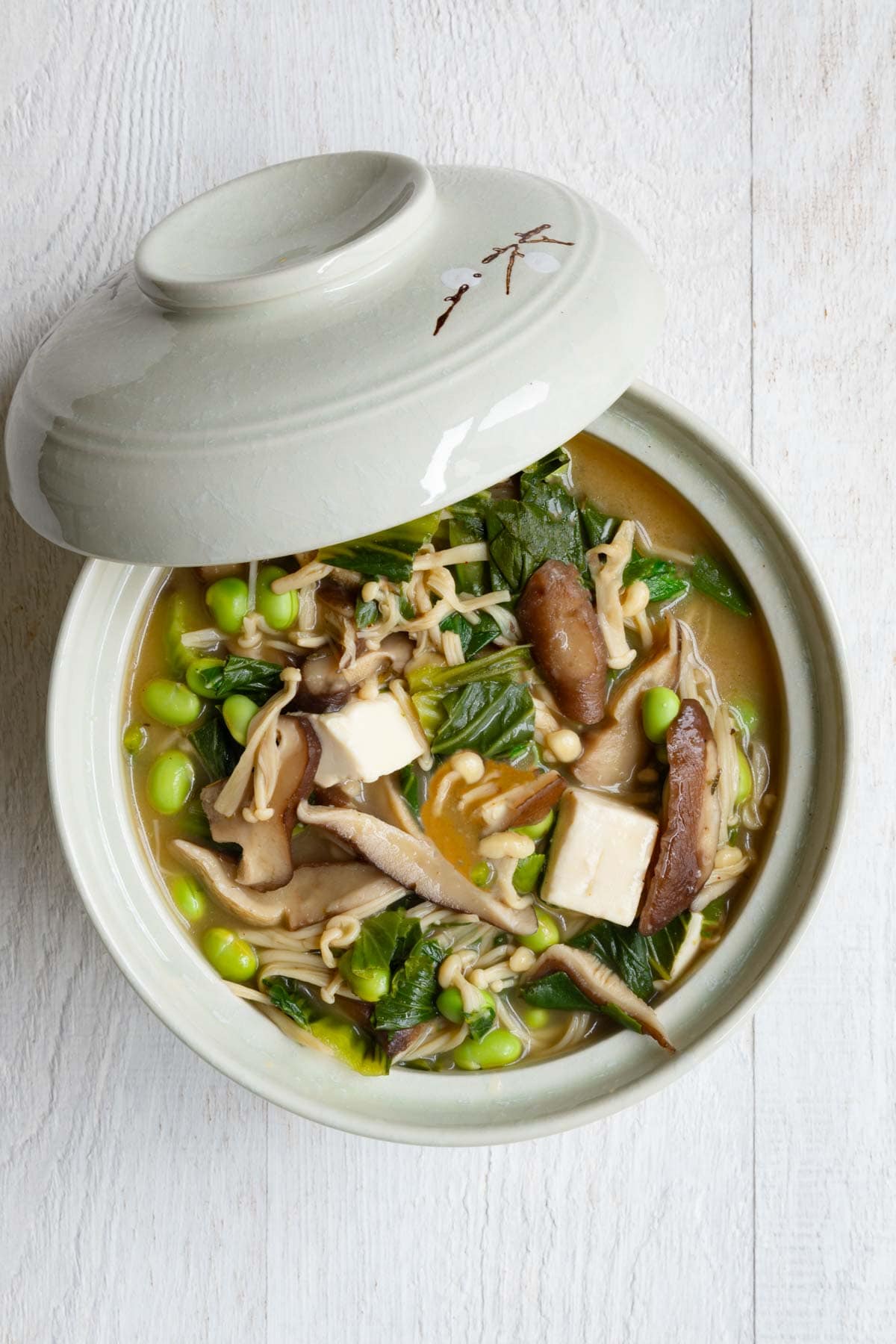 Easy vegan ramen with silken tofu and mushrooms in a bowl.