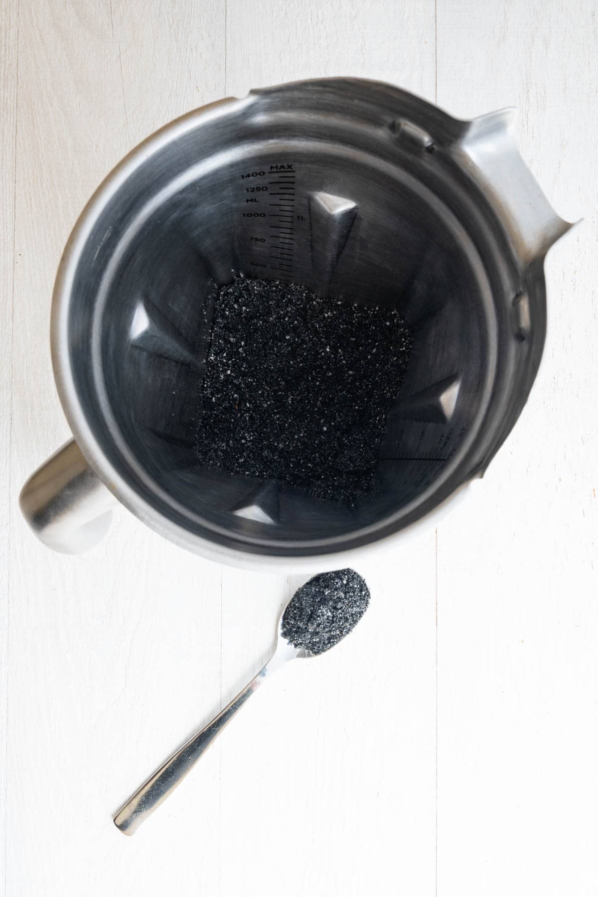 Ground black sesame seeds in a blender.