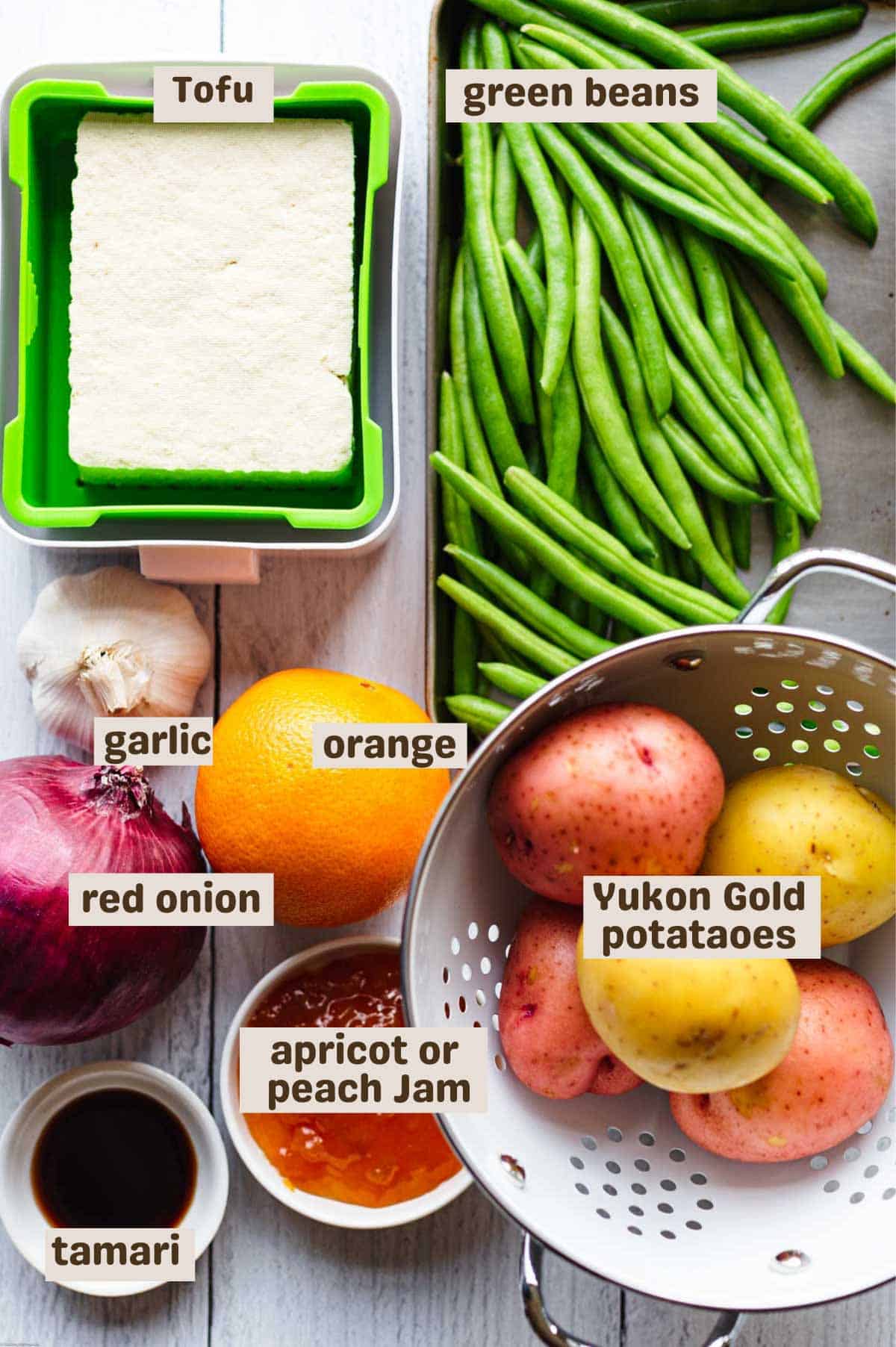 Ingredients: Tofu, green beans, Yukon Gold potatoes, red potatoes, orange, peach preserves, red onion, garlic.