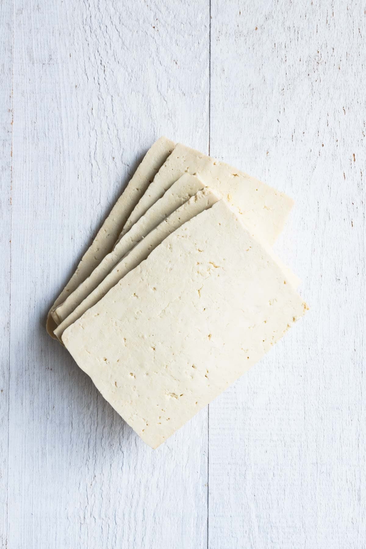 Sliced tofu in rectangles.