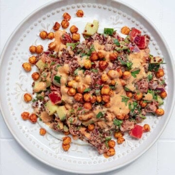 Chickpea Quinoa Mediterranean Salad on a white plate.
