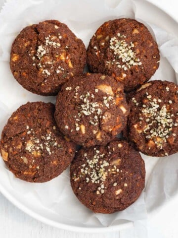 Gluten-free flourless teff breakfast muffins on a white plate.