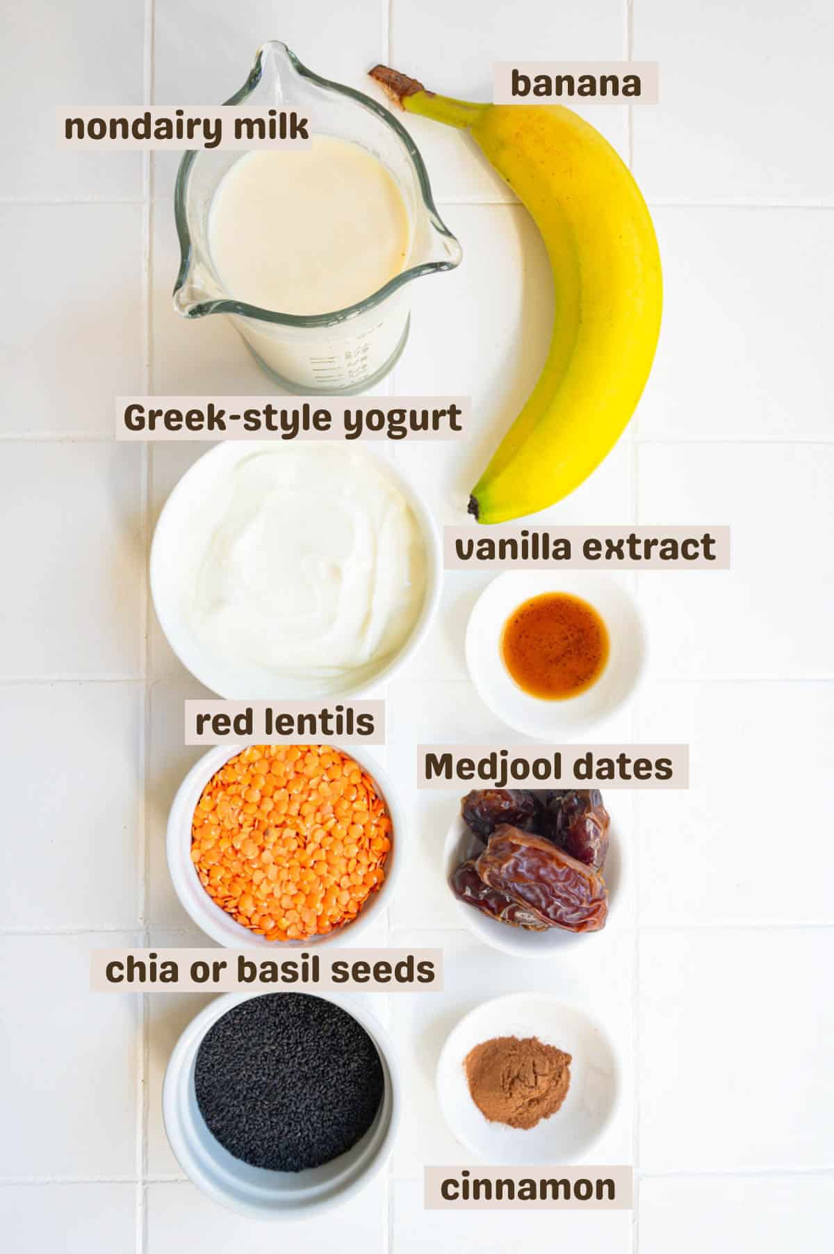 Banana, cinnamon, vanilla, red lentils, chia seeds, nondairy milk, yogurt, and dates.