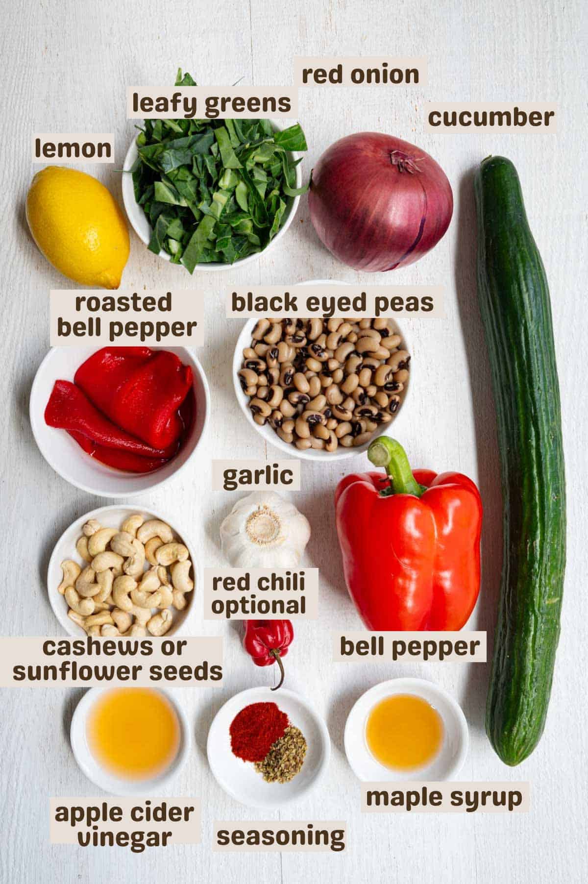 Cashews, roasted bell pepper, garlic, apple cider vinegar, lemon, red chili pepper, maple syrup, leafy greens, cucumber, black eyed peas, red bell pepper and red onion.