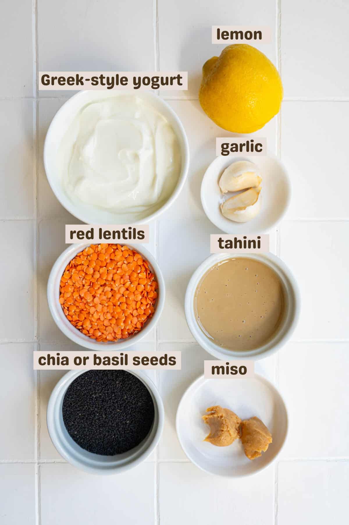 Greek-style yogurt, lemon, basil seeds or chia seeds, miso, tahini, red lentils, and garlic.
